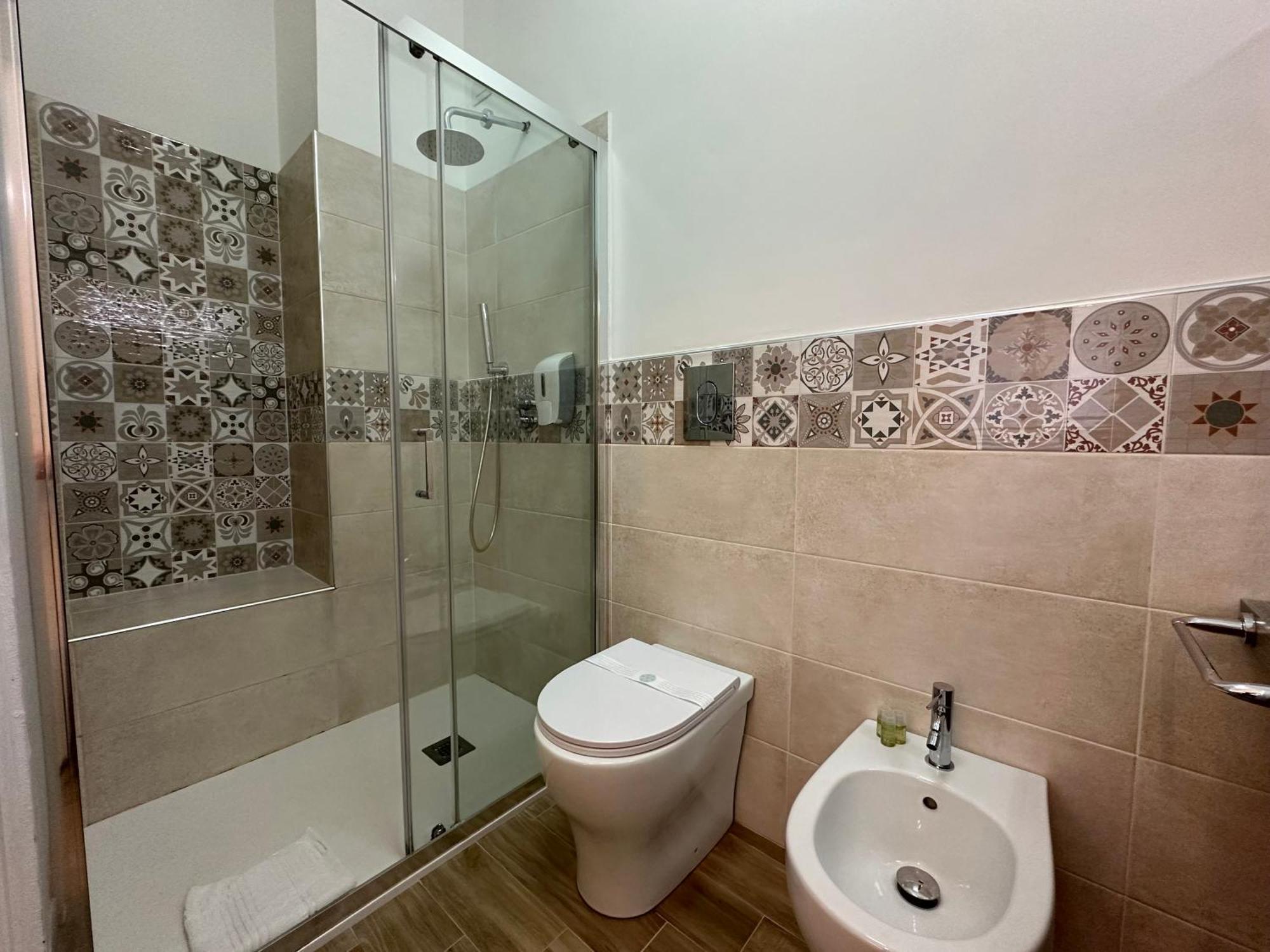 Ng Guest House L'Acquedotto Ольбія Екстер'єр фото
