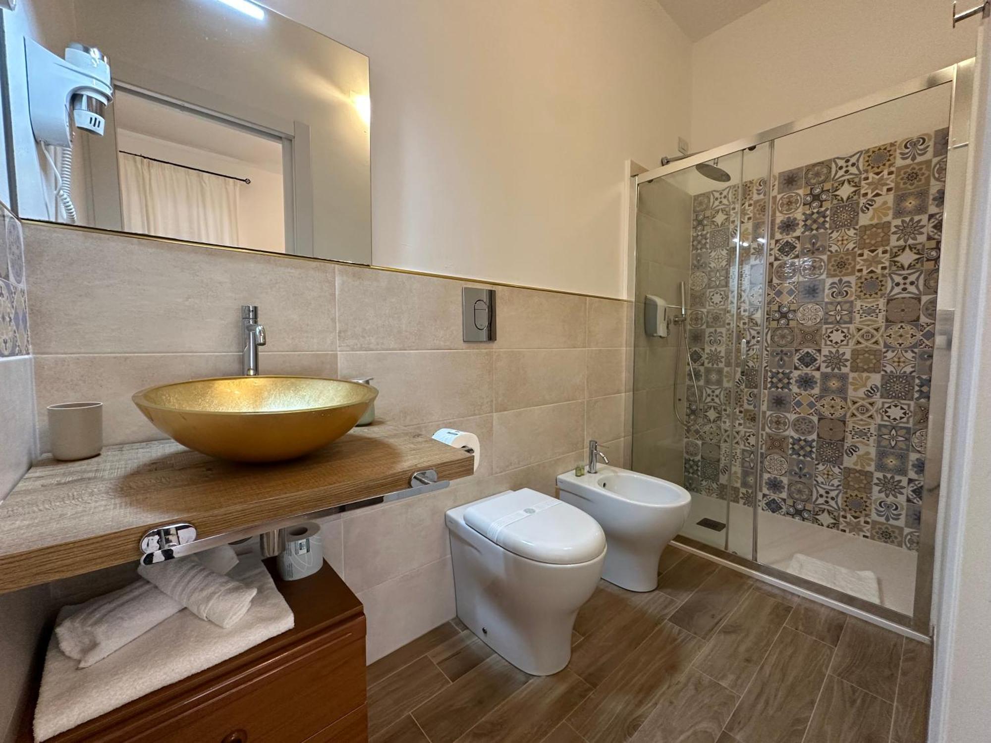Ng Guest House L'Acquedotto Ольбія Екстер'єр фото