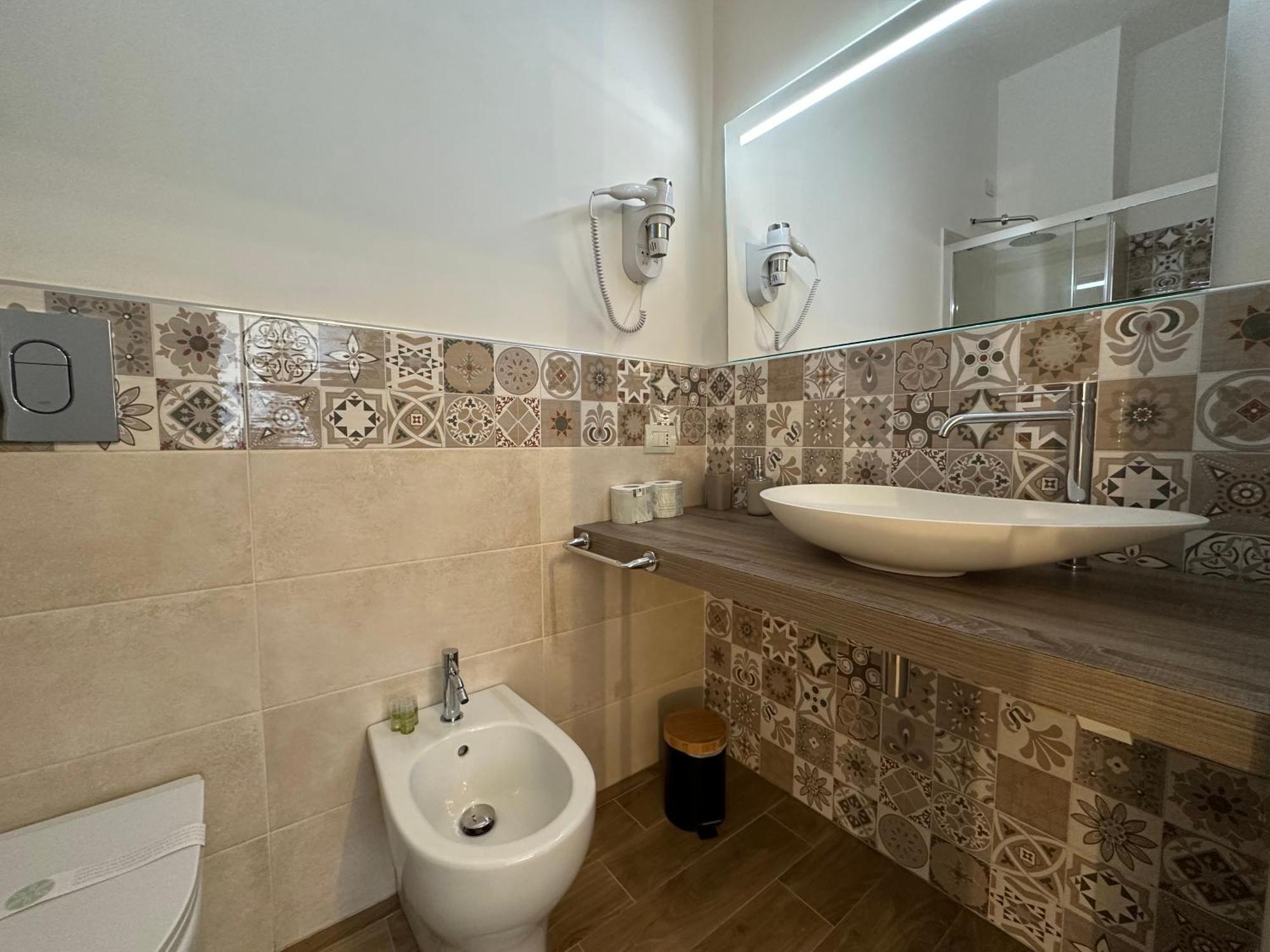 Ng Guest House L'Acquedotto Ольбія Екстер'єр фото